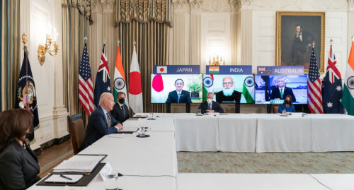 President Joe Biden, joined by Vice President Kamala Harris, Secretary of State Antony Blinken and White House staff, participates in the virtual Quad Summit with Australia, India, and Japan Friday, March 12, 2021, in the State Dining Room of the White House.