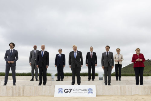 11/06/2021. Carbis Bay, United Kingdom. Prime Minister Boris Johnson poses for a family photograph with Canada's Prime Minister Justin Trudeau, France's President Emmanuel Macron, German Chancellor Angela Merkel, Italy's Prime Minister Mario Draghi, Japan's Prime Minister Yoshihide Suga European Commission President Ursula von der Leyen and European Council President Charles Michel during the G7 Leaders summit in Carbis Bay. Picture by Simon Dawson / No 10 Downing Street