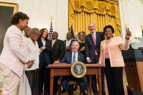 President Joe Biden signs a bill that officially make Juneteenth a federal holiday
