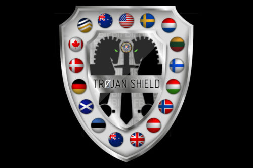 Shield graphic depicting flags of countries participating in Operation Trojan Shield.