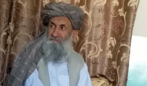 Mullah Hassan Akhund is seen in a photo released by the Taliban.