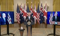 US President Joe Biden speaking about the AUKUS agreement, with Australian Prime Minister Scott Morrison (left) and UK Prime Minister Boris Johnson (right) on video screens.