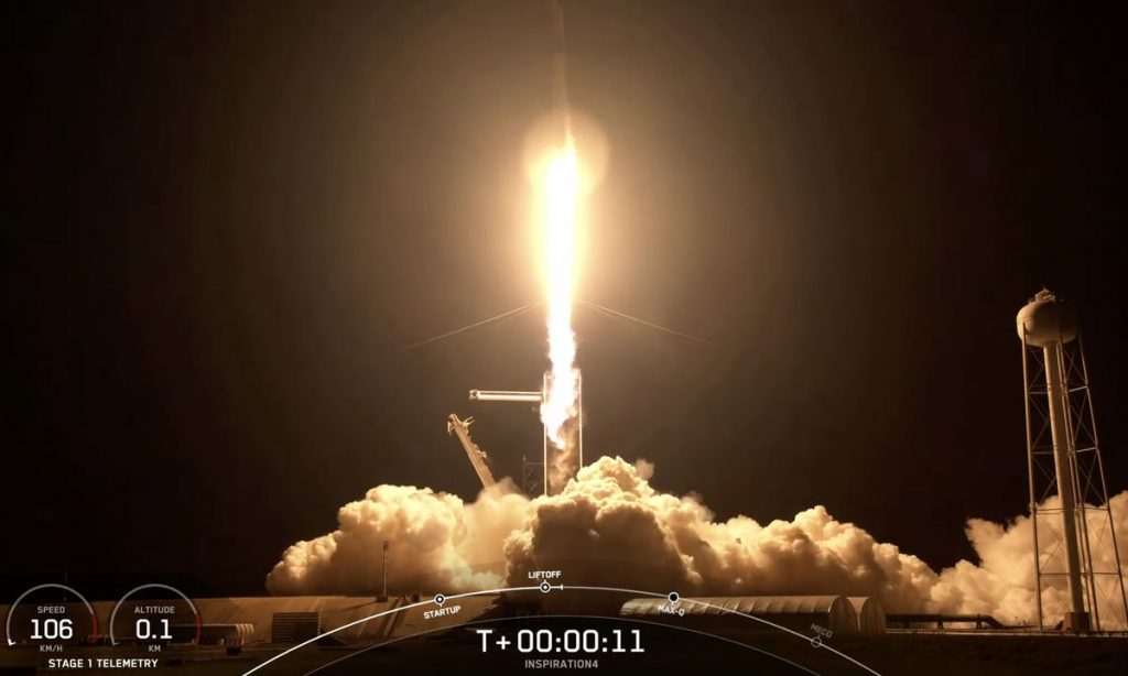 The launch of the Falcon9 rocket carrying the Inspiration4 mission into space.