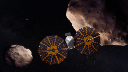 This artist’s concept depicts the Lucy spacecraft flying past the Trojan asteroid (617) Patroclus and its binary companion Menoetius.