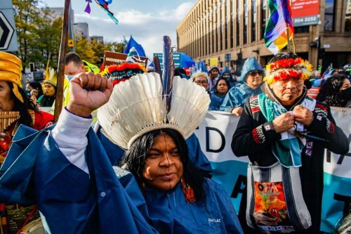 Indigenous protesters during the Global Day of Action for Climate Justice march in Glasgow, Scotland.