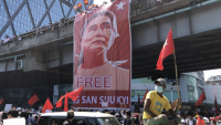 Protestors under Aung San Suu Kyi banner at Hledan Yangon