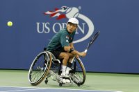 Wheelchair tennis pro Shingo Kunieda makes a backhand return at the 2017 US Open.