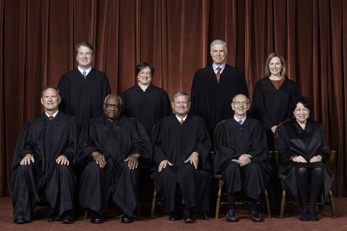 The Supreme Court as composed October 27, 2020 to present. Front row, left to right: Associate Justice Samuel A. Alito, Jr., Associate Justice Clarence Thomas, Chief Justice John G. Roberts, Jr., Associate Justice Stephen G. Breyer, and Associate Justice Sonia Sotomayor. Back row, left to right: Associate Justice Brett M. Kavanaugh, Associate Justice Elena Kagan, Associate Justice Neil M. Gorsuch, and Associate Justice Amy Coney Barrett.