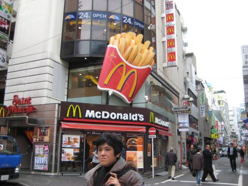 Shibuya McDonald's, with giant fries model outside.