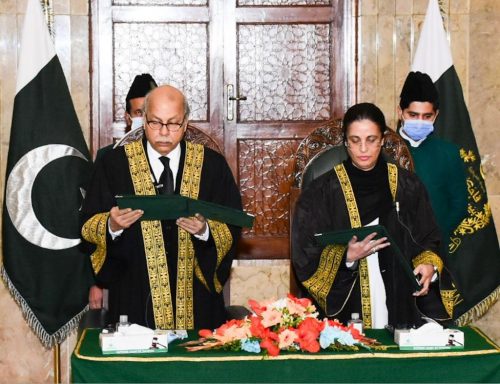 Chief Justice of Pakistan Gulzar Ahmad administers the oath to Justice Ayesha Malik as judge of the Supreme Court of Pakistan in Islamabad on January 24, 2022.