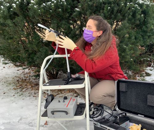 Elizabeth Clare sampling air to collect airborne DNA.