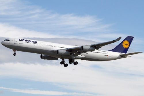 A flying Airbus A340 in Lufthansa livery