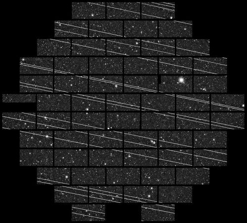 Image from Blanco 4-meter telescope at the Cerro Tololo Inter-American Observatory (CTIO), 333 seconds-exposure image by astronomers Clara Martínez-Vázquez and Cliff Johnson. Image contains at least 19 streaks created by the second batch of Starlink satellites launched November 2019.