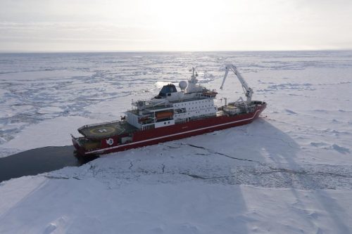 An aerial shot showing the ice breaker used by the Endurance22 team in the middle of the ice on the Weddell Sea