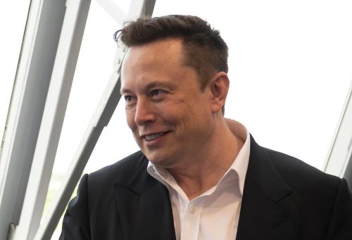 Elon Musk, SpaceX Chief Engineer, shakes hands with Steve Stich, deputy manager of NASA’s Commercial Crew Program, following the launch of a SpaceX Falcon 9 rocket carrying the company's Crew Dragon spacecraft on the Demo-2 mission with NASA astronauts Douglas Hurley and Robert Behnken onboard, Saturday, May 30, 2020.