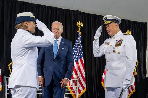US President Joe Biden looks on as Admiral Linda Fagan relieves Admiral Karl Schultz as the 27th commandant of the Coast Guard during a change of command ceremony at Coast Guard headquarters June 1, 2022. Fagan is the first woman Service Chief of any U.S. military service.