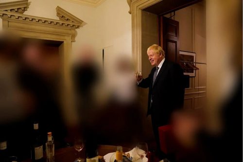 A photograph of Boris Johnson drinking wine at a leaving gathering on 13 November 2020. Published in the Sue Gray report.