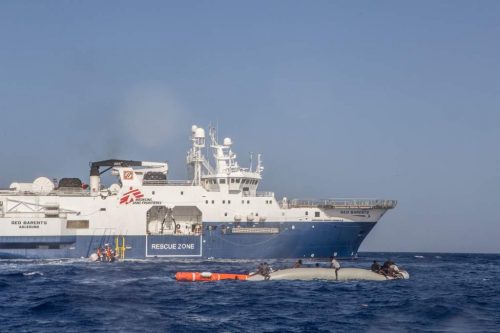 Doctors Without Borders/Médecins Sans Frontières (MSF)'s Search and Rescue team bringing 71 survivors from the flimsy sinking rubber boat on board the search and rescue vessel the Geo Barents in June, 2022.