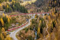 Aerial photo of the world record attempt with the longest passenger train on the UNESCO World Heritage route 'Albula' on October 29, 2022 in Berguen in Graubuenden/Switzerland.