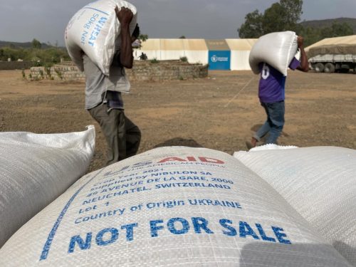 Ethiopia, Selekleka, Tigray Region, 25 May 2022. In the photo: WFP food arrives from Mekelle to be delivered to communities in the North West Tigray, who haven’t received food assistance for over 8 months. The food is unloaded at a distribution site in Selekleka, North-western Zone of Tigray.