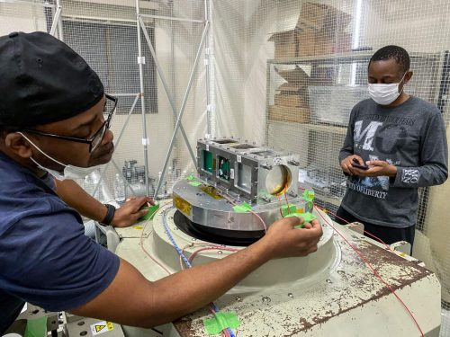 The BIRDS-5 team from Zimbabwe conducts vibration testing. BIRDS-5 is a constellation of CubeSats developed by Uganda, Zimbabwe, and Japan that will be deployed from the space station. Image courtesy of BIRDS-5.