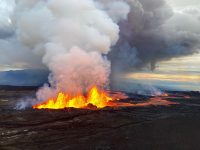 Aerial photograph of the dominant fissure 3 erupting on the Northeast Rift Zone of Mauna Loa, taken at approximately 8 a.m. HST November 29, 2022. Fissure 3 fountains were up to 25 m (82 ft) this morning and the vent was feeding the main lava flow to the northeast.