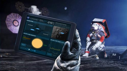 An artist's idea of what LunaNet might look like on the moon. In the foreground is an astronaut's gloved hand with a tablet computer. A suited astronaut is crouched in the background on the lunar surface.