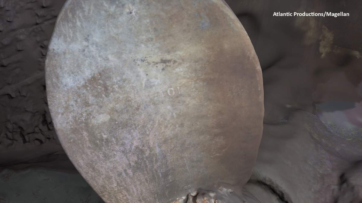 Image of the blade of a propeller on the Titanic, with part of the serial number visible.