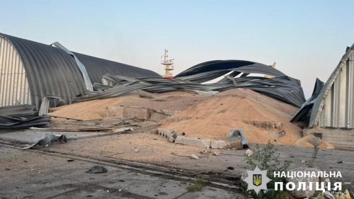 Stockpiles of grain are exposed after the arched metal buildings protecting them were destroyed. Port infrastructure on the Danube in the Odesa region of Ukraine after a Russian drone attack on the night of 24 July 2023. Granaries were destroyed, tanks for other cargoes were damaged, 6 people were injured.