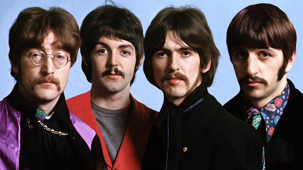 The Beatles - head and shoulders shot of John Lennon, Paul McCartney, George Harrison, and Ringo Starr.