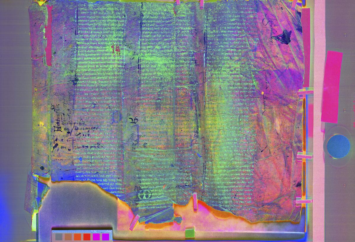 Image of the cover taken with multispectral imaging reveals hidden writing and other artifacts.