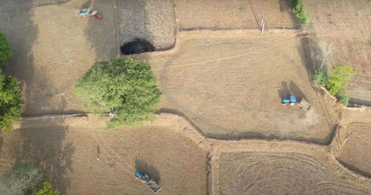 View from the air of basalt dust being applied to farm fields in India.