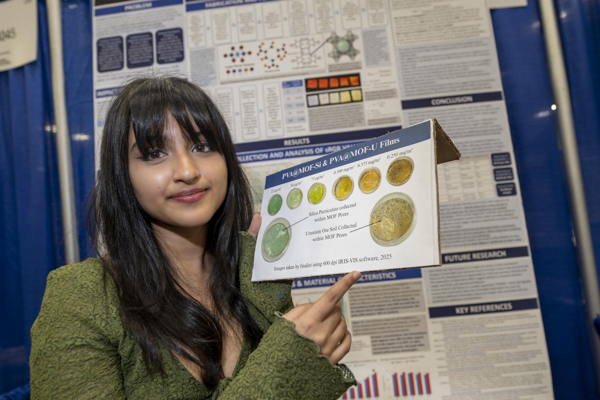 Siyaa Poddar with an example showing her color-changing tests for toxic dust.