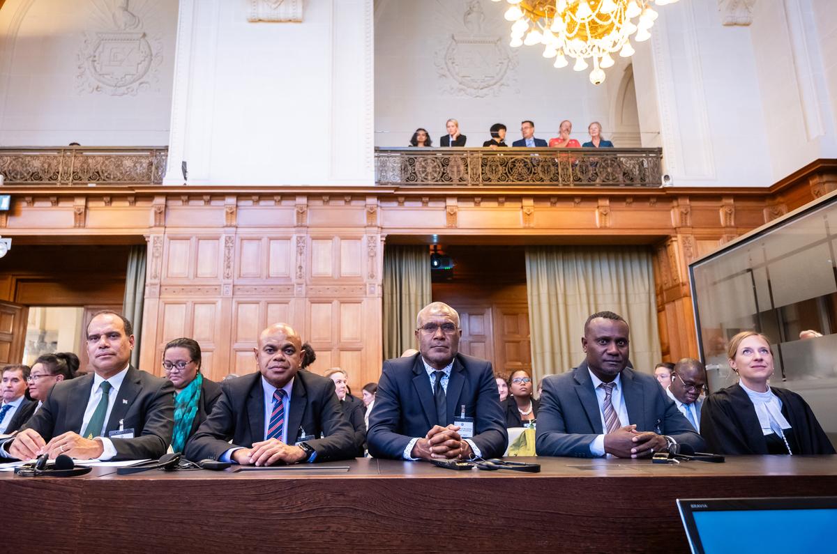 Lawyers and others representing Vanuatu and other island nations listen to the opinion released by the International Court of Justice last Wednesday.
