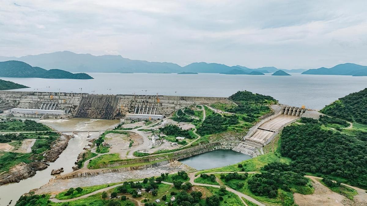 The Grand Ethiopian Renaissance Dam shown before full operations began. The massive basin of water can be seen in the background.