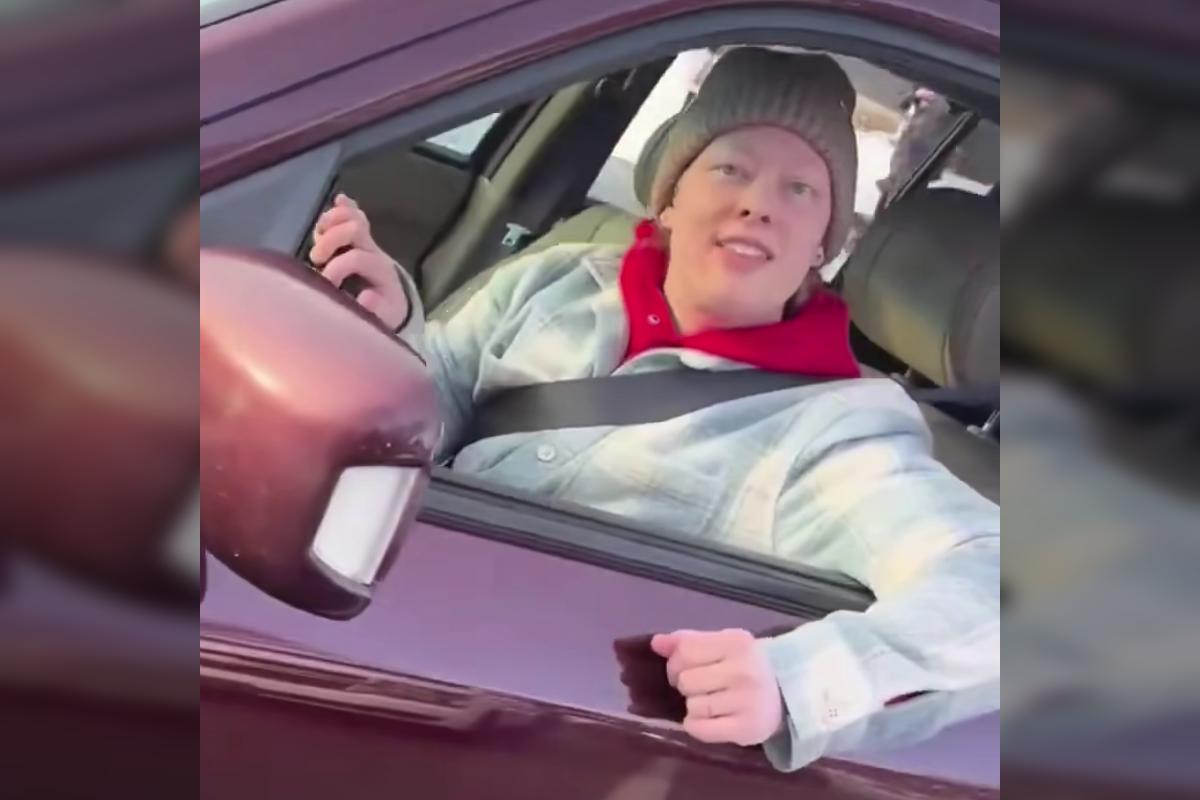 A still frame from a video taken by Jonathon Ross, the ICE agent who killed Renee Good. The image shows Renee Good looking at the camera through the open window from the driver's seat of her car.