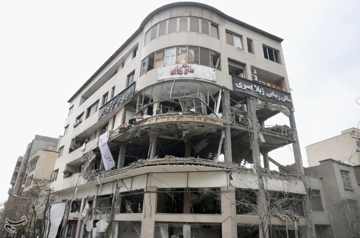 The office of Qatar's Al-Arabi Network on Heravi Street in Tehran, hit by a rocket.