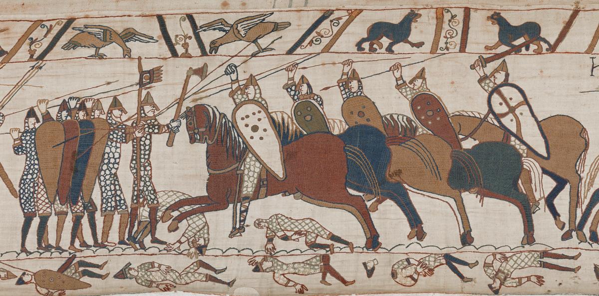 Detail of Scene 52 of the Bayeux Tapestry, showing a group of horsemen fighting with spears and swords, armoured with mail-shirts and helmets, and carrying shields